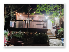 A picture of our cabins all lit up at night