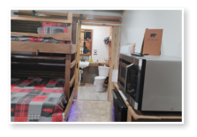 the bedroom in one of our cabins